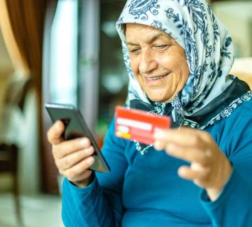 Elderly lady using online banking