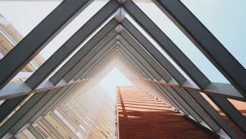 Upward view of a steel structure on a building.