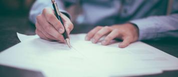Man writing on paper