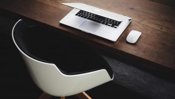 Laptop on a wooden desk