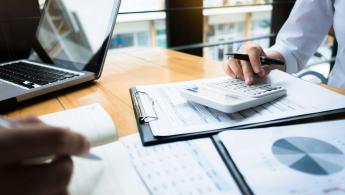 finance meeting at a desk