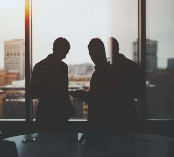 People in an office - aman private banking